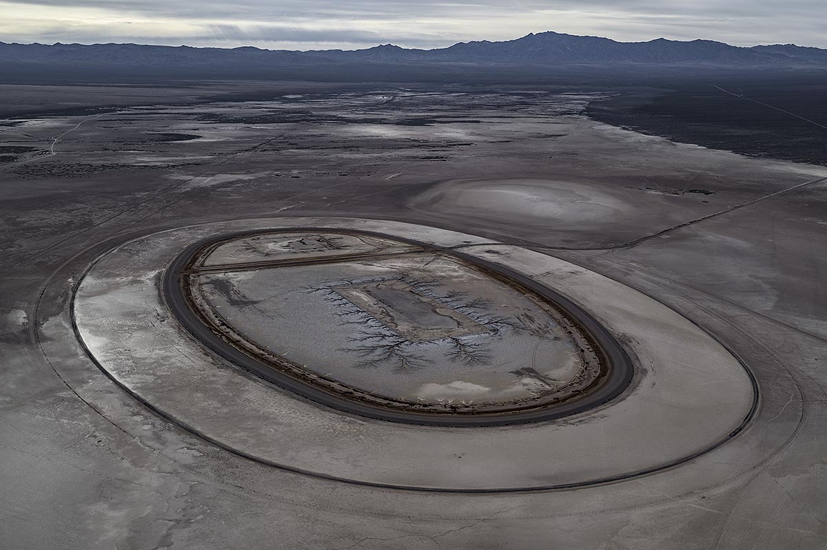 leftscape #10, usa, 2017 (3 times fenced hazardous waste site on the border between california and nevada. the liquids evaporated or entered the soil)